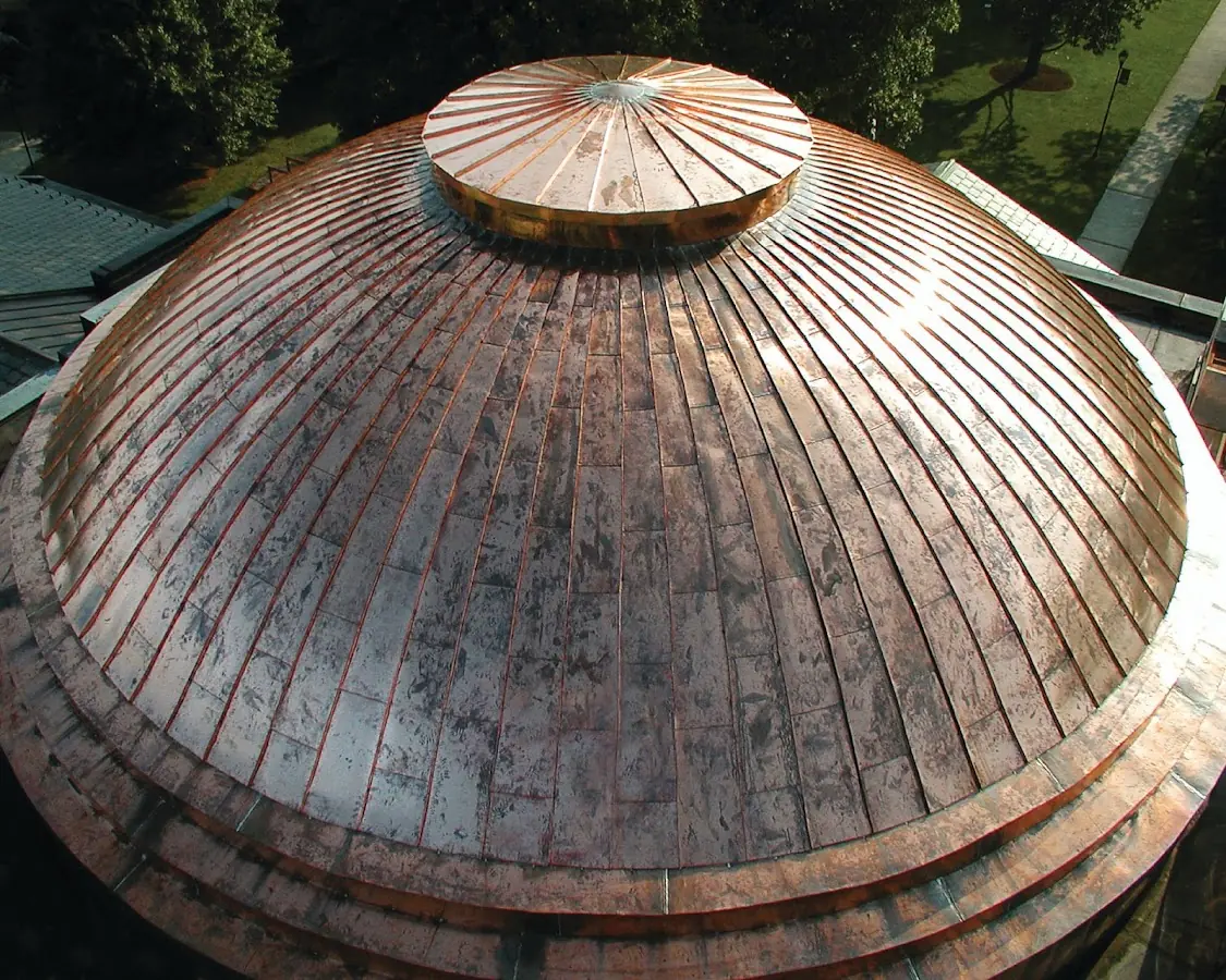 Craftsman Roofing crew installing a new roof in Jones